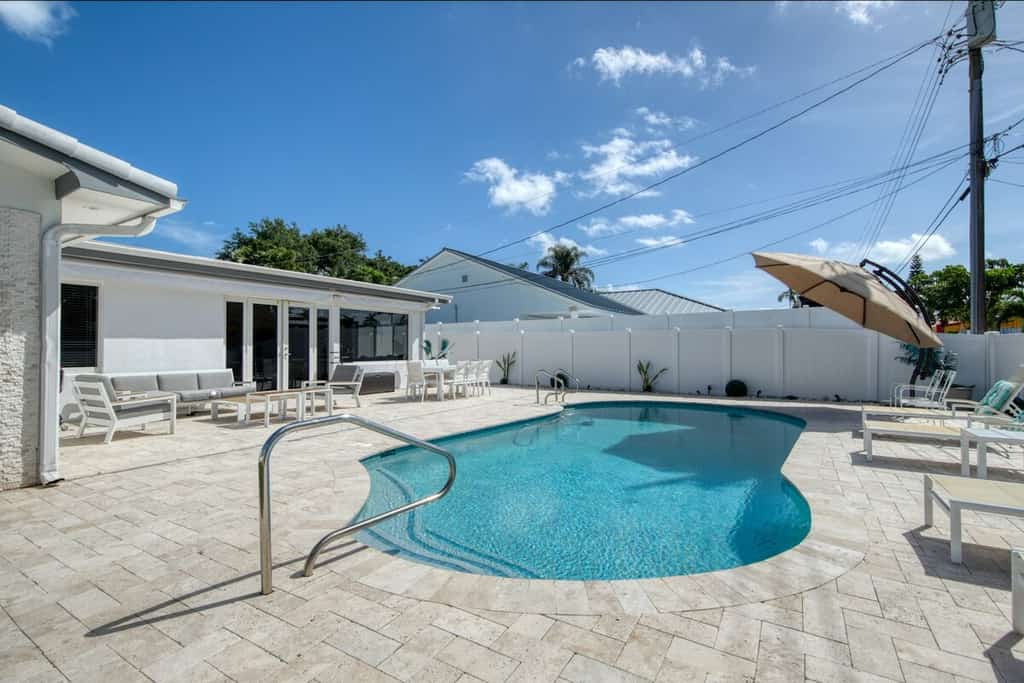 Fully-equipped home with pool, grill, streaming, children's items, W/D, & AC