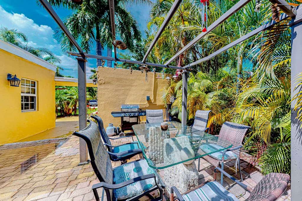 Inviting dog-friendly home with patio, grill, central AC, enclosed yard, & W/D