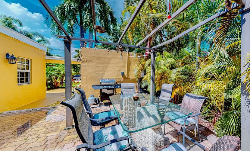 Inviting dog-friendly home with patio, grill, central AC, enclosed yard, & W/D