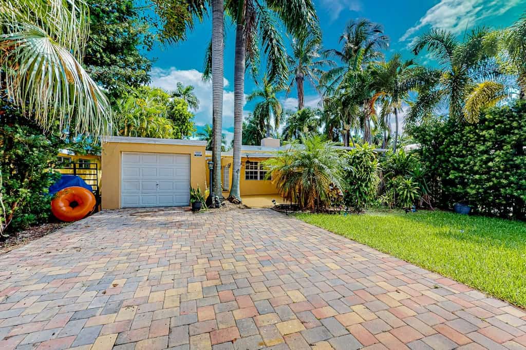 Inviting dog-friendly home with patio, grill, central AC, enclosed yard, & W/D