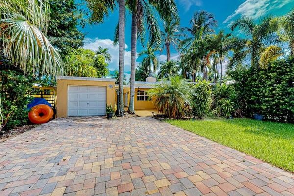 Inviting dog-friendly home with patio, grill, central AC, enclosed yard, & W/D