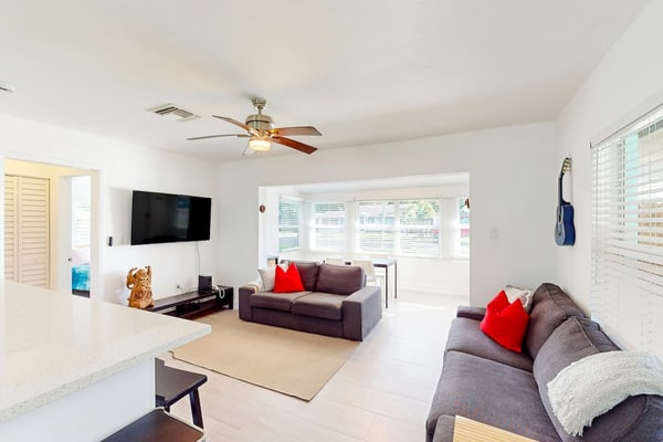 Turquoise charmer with enclosed yard, open layout, & W/D - snowbird-friendly