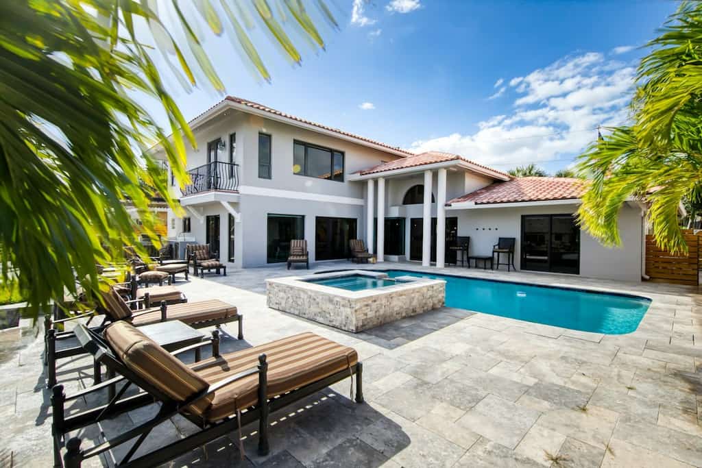 Luxury, waterfront, dog-friendly home with pool, pool spa, & incredible terrace