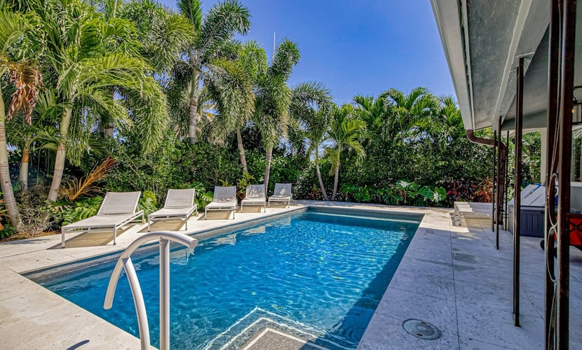 Wilton Manors designer delight with private pool, outdoor kitchen & Florida room