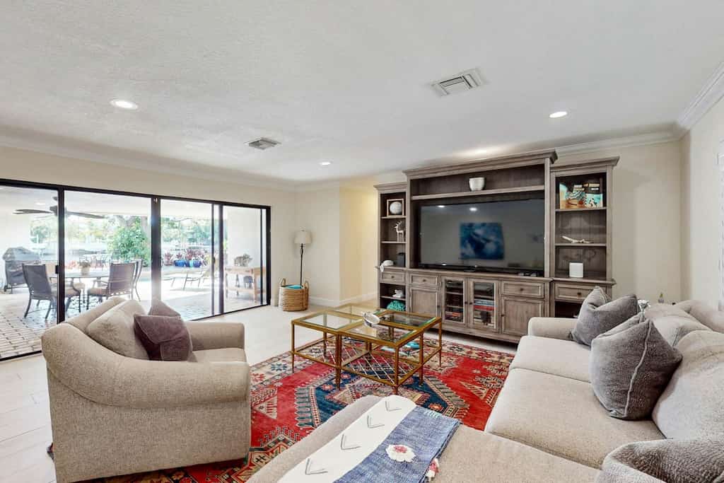 Luxury Waterfront Living: Private Pool, Boat Dock, Game Room - Near Beach