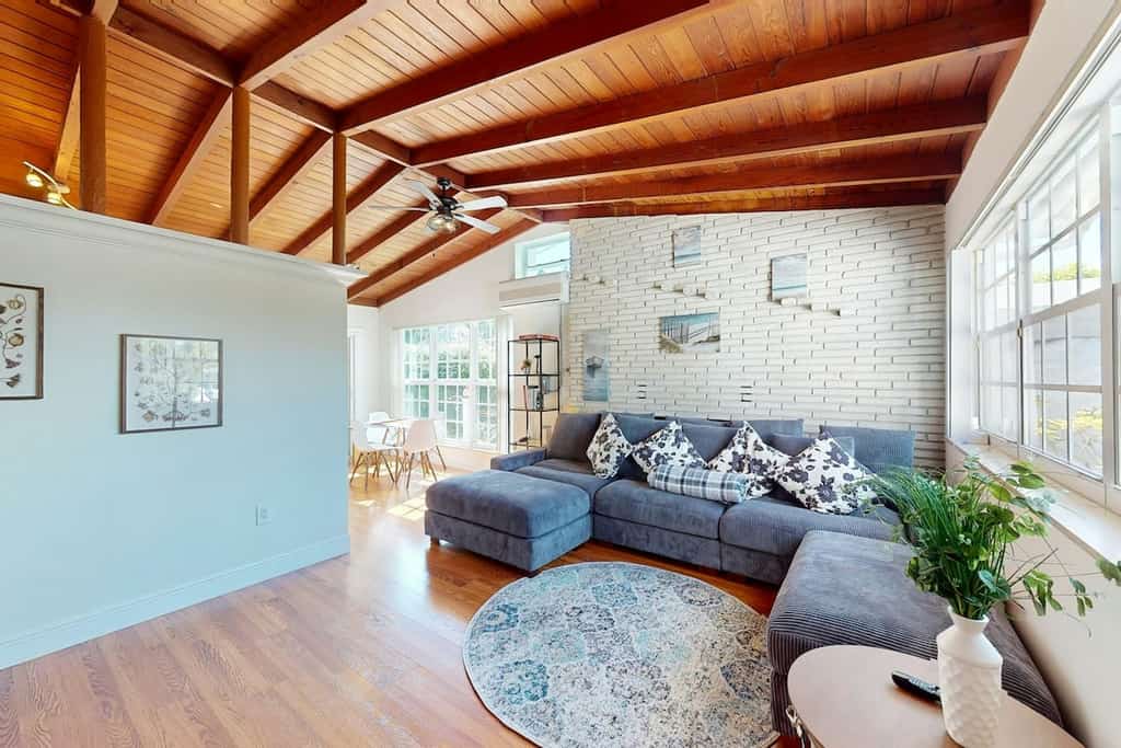 Single-level home with private yard, screened patio, AC, & W/D