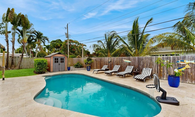 Inviting villa with heated saltwater pool & tropical backyard oasis