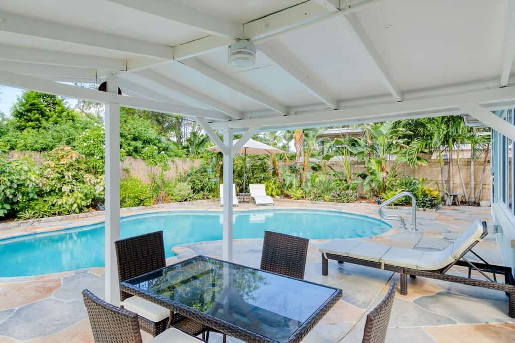 Charming home with oasis-like backyard, pool, washer/dryer, & central AC