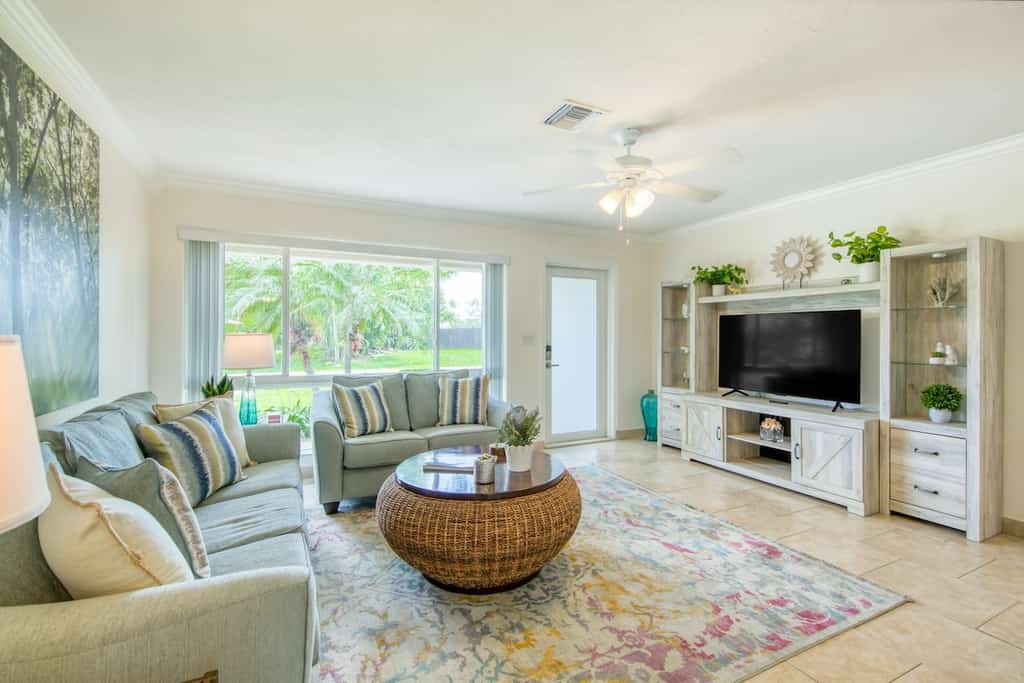 Charming home with oasis-like backyard, pool, washer/dryer, & central AC