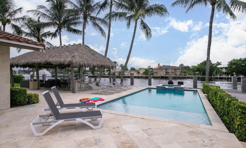 Exquisite dog-friendly home with pool, spa, dock, fast WiFi, central AC, & W/D