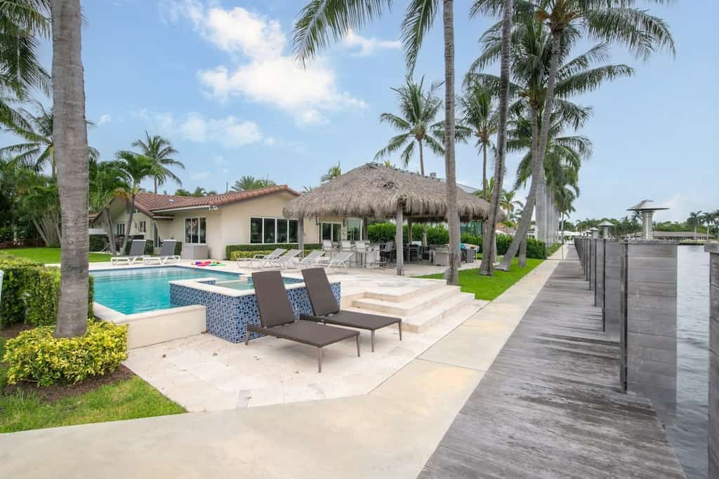 Exquisite dog-friendly home with pool, spa, dock, fast WiFi, central AC, & W/D