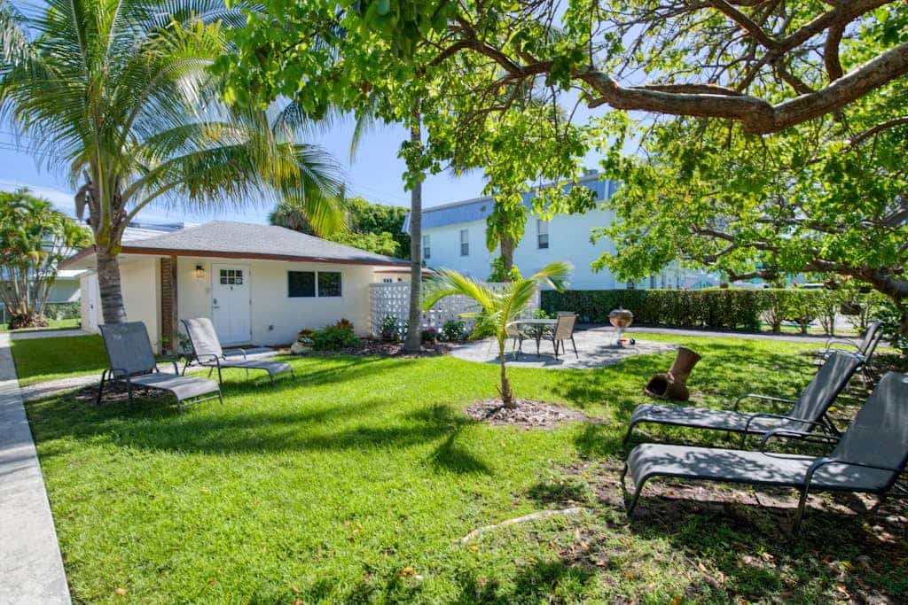 Large, cozy condo a walk from the beach with central AC and shared yard