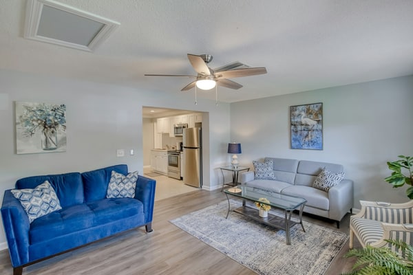 Large, cozy condo a walk from the beach with central AC and shared yard