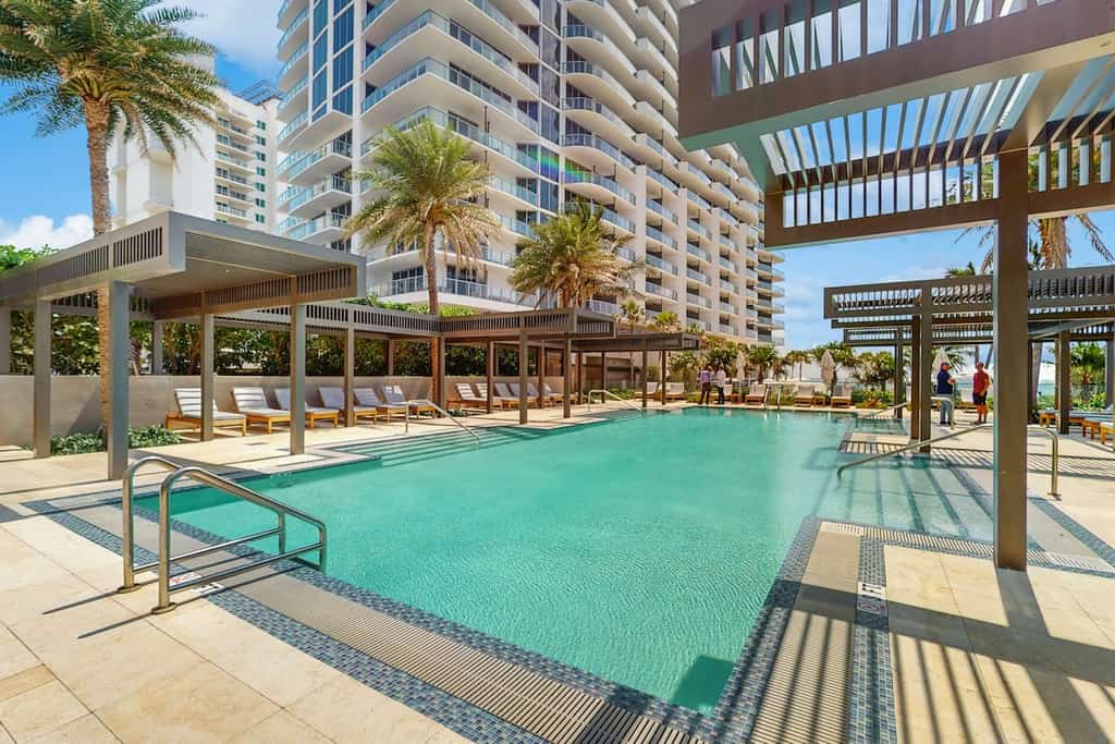 Dog friendly, beach front condo with pool, hot tub & fully equipped fitness room