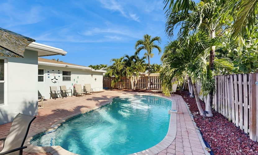 Beautiful & airy dog-friendly home near the beach with private pool, yard, grill