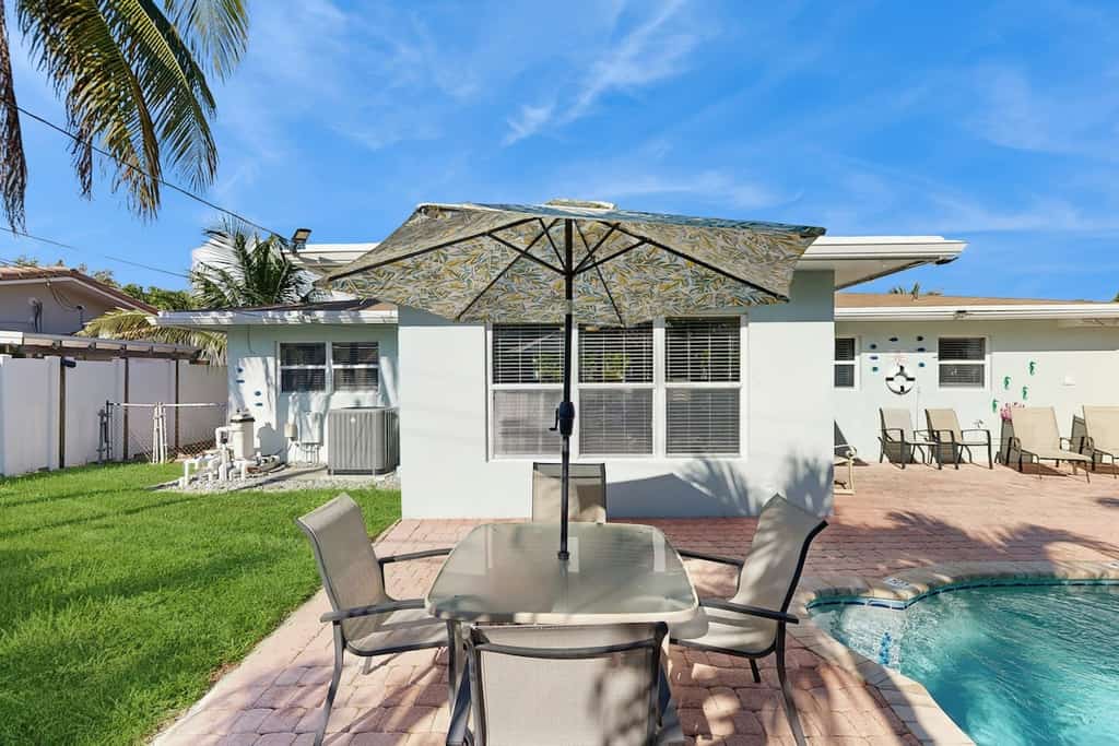Beautiful & airy dog-friendly home near the beach with private pool, yard, grill