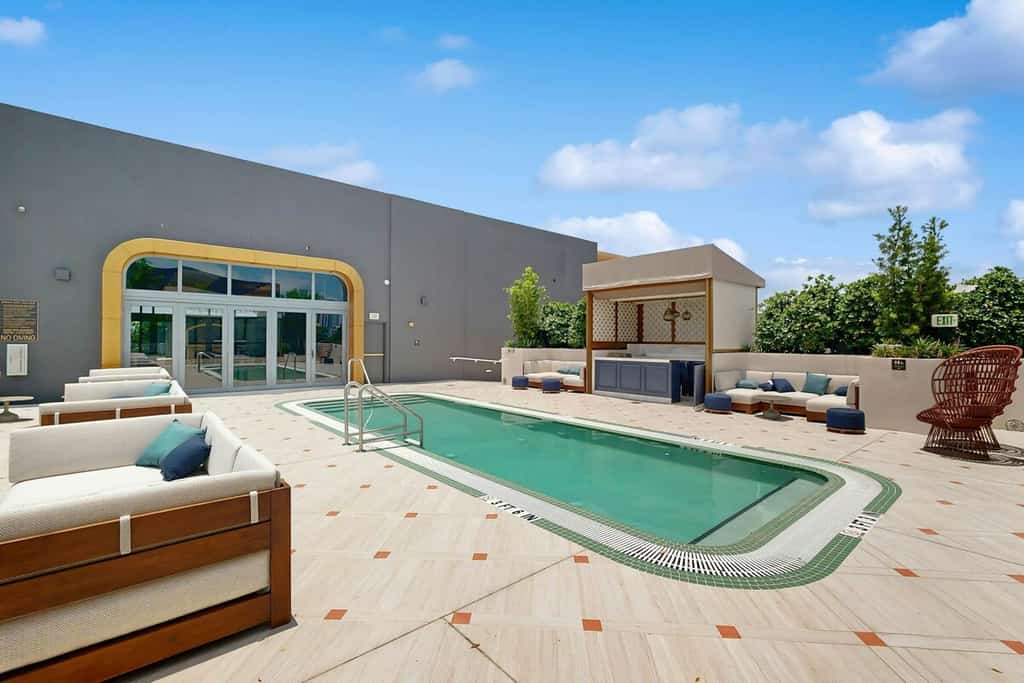 Contemporary condo with rooftop pool, balcony & designer amenities