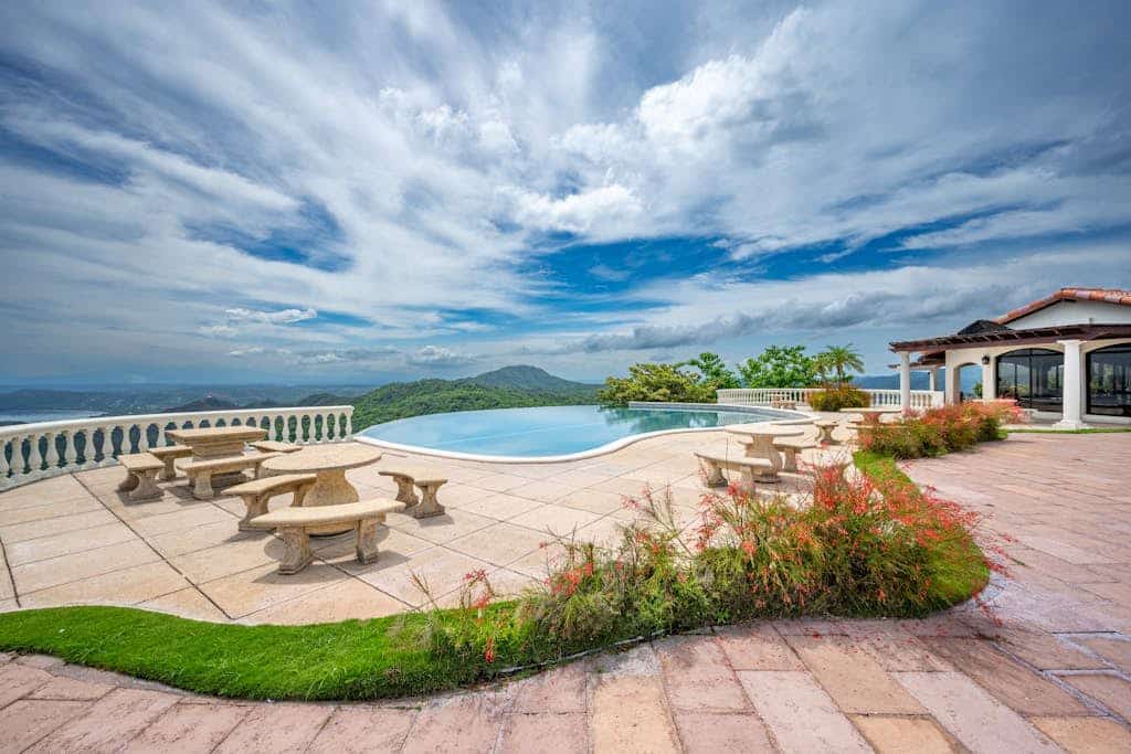Seaside Mansion with Majestic Ocean Views and patio overlooking infinity pool