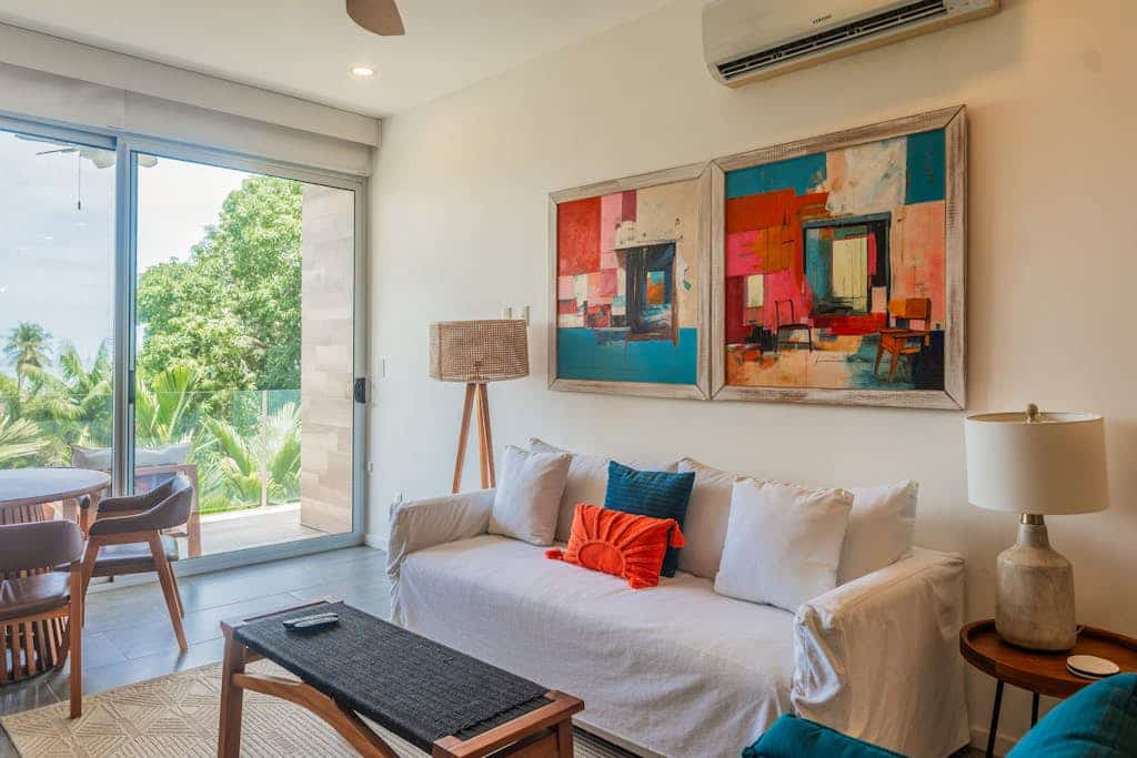 Modern condo with partial ocean view, pool, high-speed internet & full kitchen