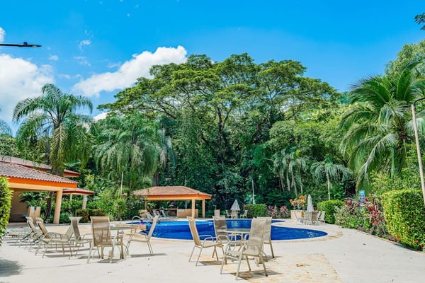 Exotic villa with community pool access, playground, volleyball court & wifi