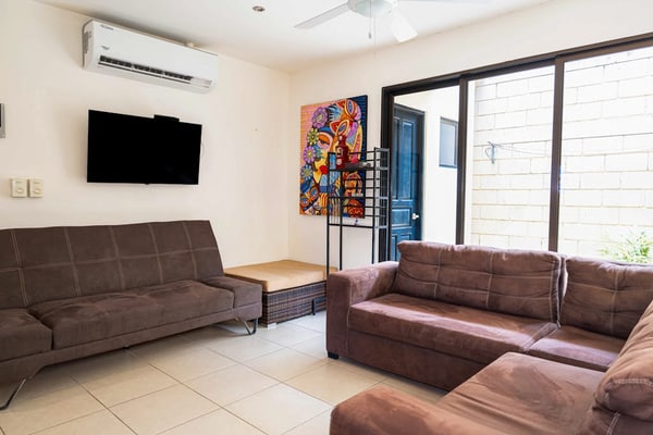 Exotic villa with community pool access, playground, volleyball court & wifi