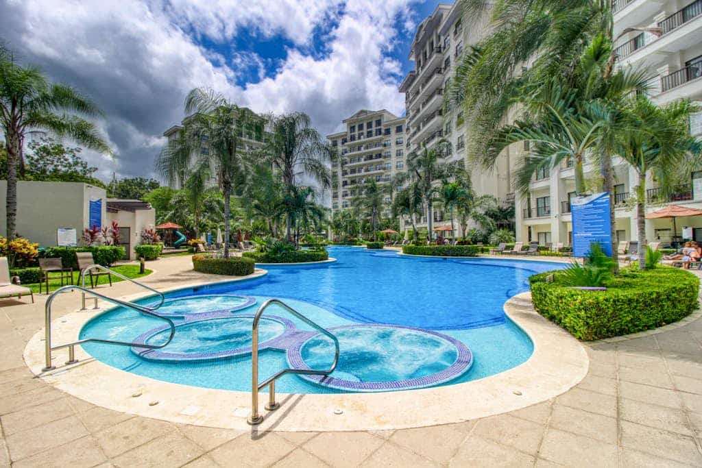 Upscale, Modern Condo with Ocean Views, Shared Pool, and WiFI