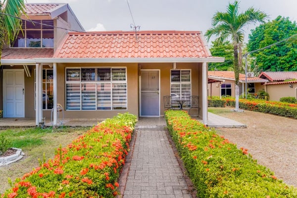 Tropical, dog-friendly getaway with beach access, outdoor pool, hot tub & AC