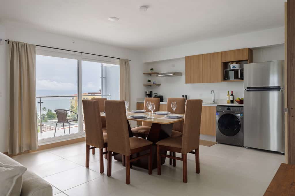 Enjoy a spacious 13th-floor ocean view condo with an open concept and modern furnishings. This fully equipped unit offers a master bedroom with a king-size bed, a guest bedroom with a queen-size bed, and two full bathrooms. Relax on the large balcony or take advantage of amenities including 3 pools, 2 BBQ areas, a game room, and a gym. Located across the street from the beach and within walking distance to grocery stores, restaurants, and a casino. Non-smoking, no pets allowed.
