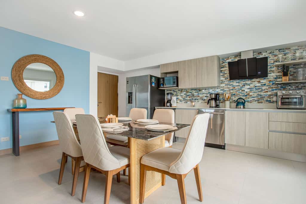 Enjoy an unforgettable stay in this modern and stylish condo in Jacó, Costa Rica. Featuring an open-concept design, spacious living room with sectional sofa, fully equipped kitchen, and tropical décor, it’s the perfect place to relax after a day of adventure. Just minutes from the beach, local restaurants, and Jacó’s vibrant nightlife. Ideal for families or couples seeking comfort, style, and a prime location close to surfing, waterfalls, and national parks.