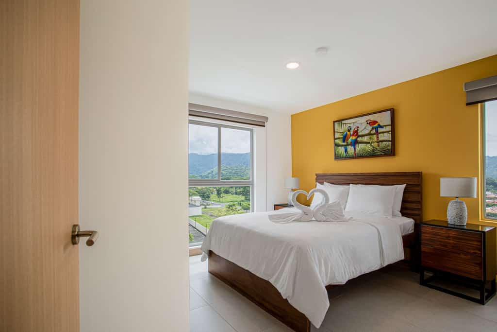 Enjoy an unforgettable stay in this modern and stylish condo in Jacó, Costa Rica. Featuring an open-concept design, spacious living room with sectional sofa, fully equipped kitchen, and tropical décor, it’s the perfect place to relax after a day of adventure. Just minutes from the beach, local restaurants, and Jacó’s vibrant nightlife. Ideal for families or couples seeking comfort, style, and a prime location close to surfing, waterfalls, and national parks.