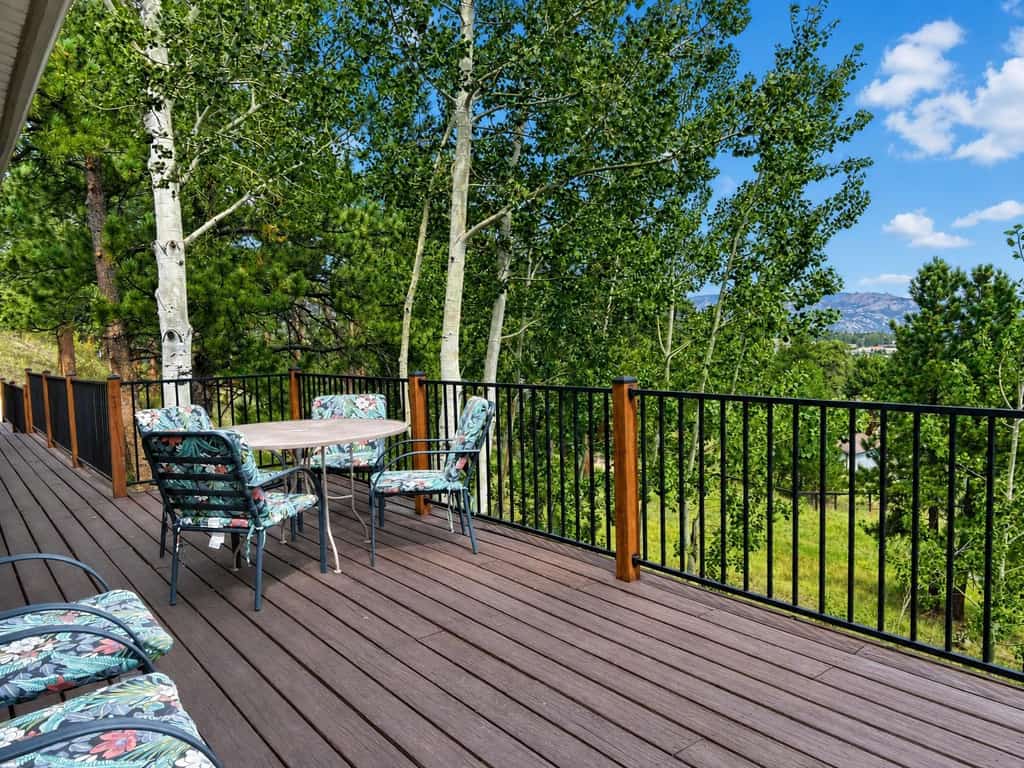 Mountain-view 3BR with hot tub, fireplace, and roomy family spaces.