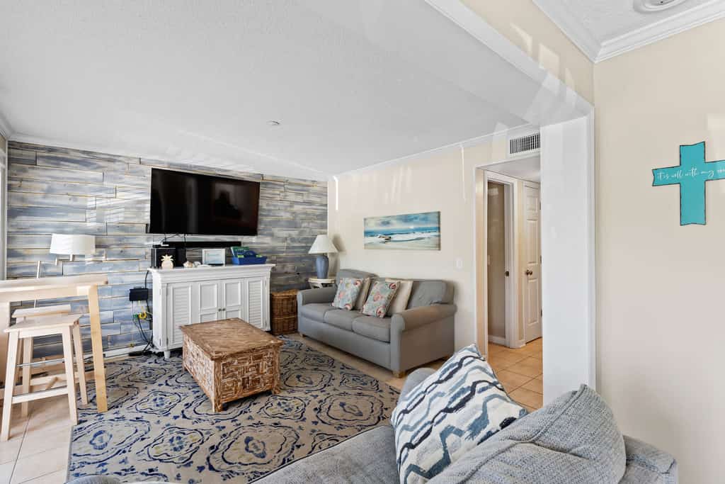 Enjoy a relaxing beach getaway at Hilton Head Beach and Tennis Resort in Admiral's Row on Hilton Head Island. This comfortable 2-bedroom, 2-bath condo features a peek of ocean view, a fully equipped kitchen, high-speed Wi-Fi, cable TV, and easy access to the beach and resort amenities. Enjoy two pools, including the resort's main beachfront pool and a private pool for Admiral's Row, plus tennis, pickleball, fitness facilities, dining, and more. 