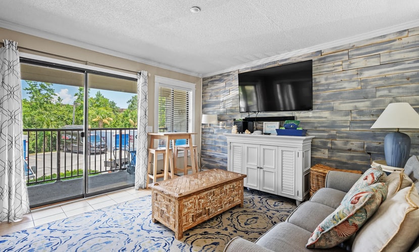 Enjoy a relaxing beach getaway at Hilton Head Beach and Tennis Resort in Admiral's Row on Hilton Head Island. This comfortable 2-bedroom, 2-bath condo features a peek of ocean view, a fully equipped kitchen, high-speed Wi-Fi, cable TV, and easy access to the beach and resort amenities. Enjoy two pools, including the resort's main beachfront pool and a private pool for Admiral's Row, plus tennis, pickleball, fitness facilities, dining, and more.