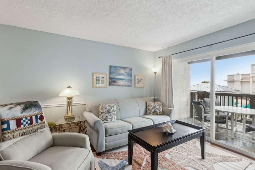 Beachfront 2BR • Pool • Direct Access