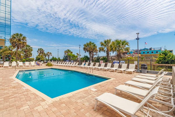 Discover your perfect beach vacation at this tenth floor oceanfront apartment in Myrtle Beach. Designed for comfort and convenience, our property features a well appointed kitchen and a bright, welcoming living space overlooking the Atlantic Ocean. Step outside to enjoy resort style perks like indoor and outdoor pools, or take a short walk to explore the vibrant downtown area, local golf courses, and popular family attractions. From horseback riding and cycling to relaxing by the water, this central location is ideal for travelers seeking a mix of adventure and tranquility in a premier beachfront setting.