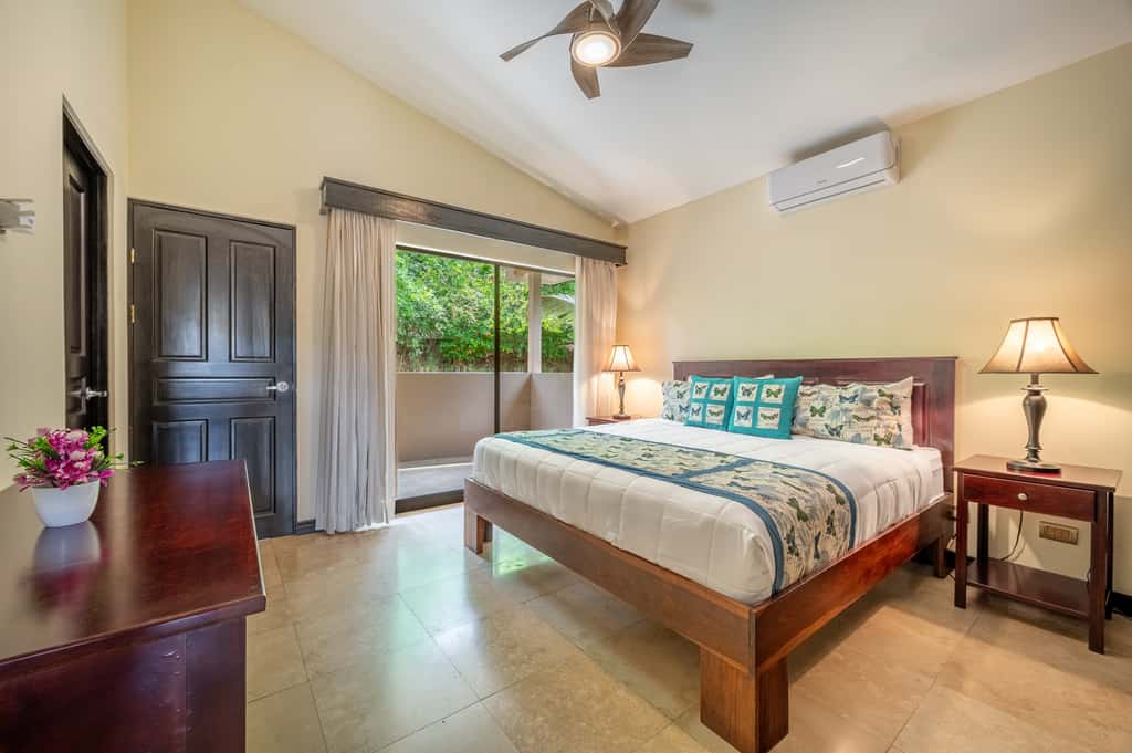 Sunny 2BR: Balcony, Pool, Kitchen, Walk to Beach