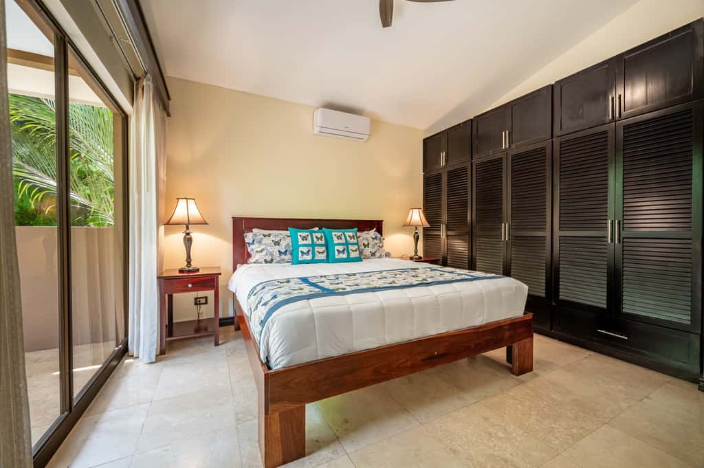 Sunny 2BR: Balcony, Pool, Kitchen, Walk to Beach