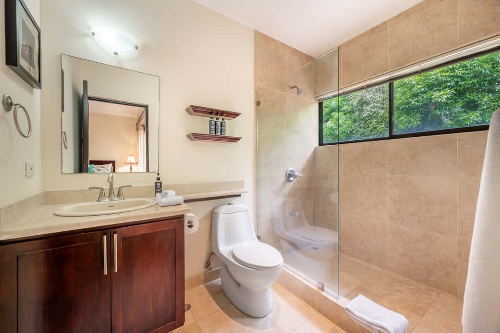 Sunny 2BR: Balcony, Pool, Kitchen, Walk to Beach