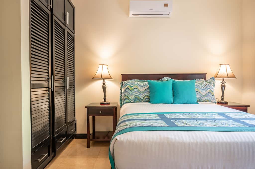 Sunny 2BR: Balcony, Pool, Kitchen, Walk to Beach