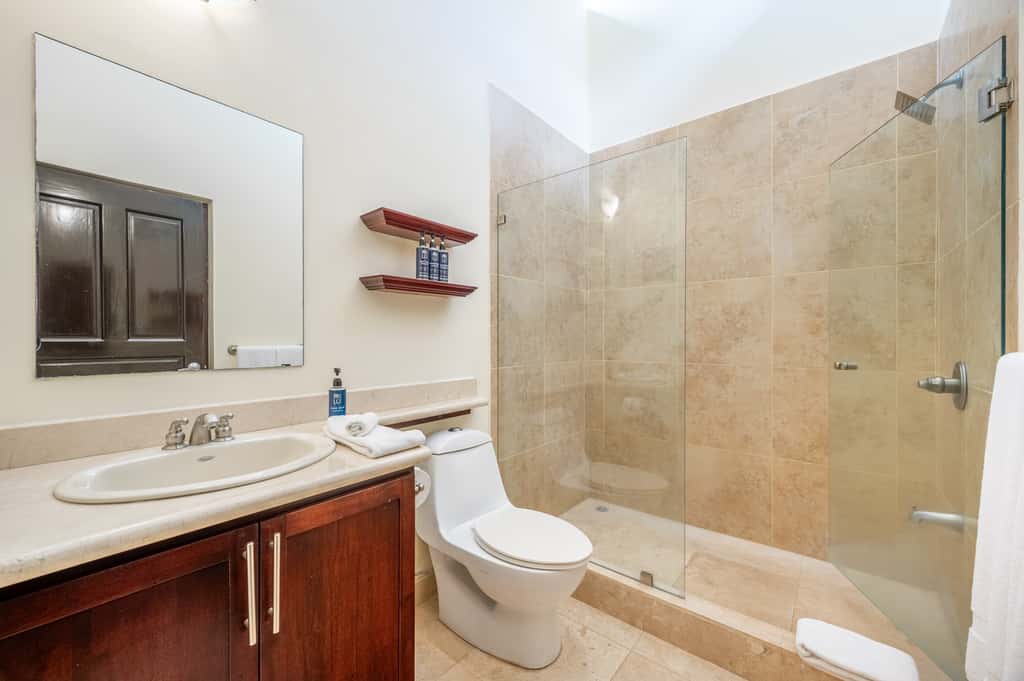 Sunny 2BR: Balcony, Pool, Kitchen, Walk to Beach