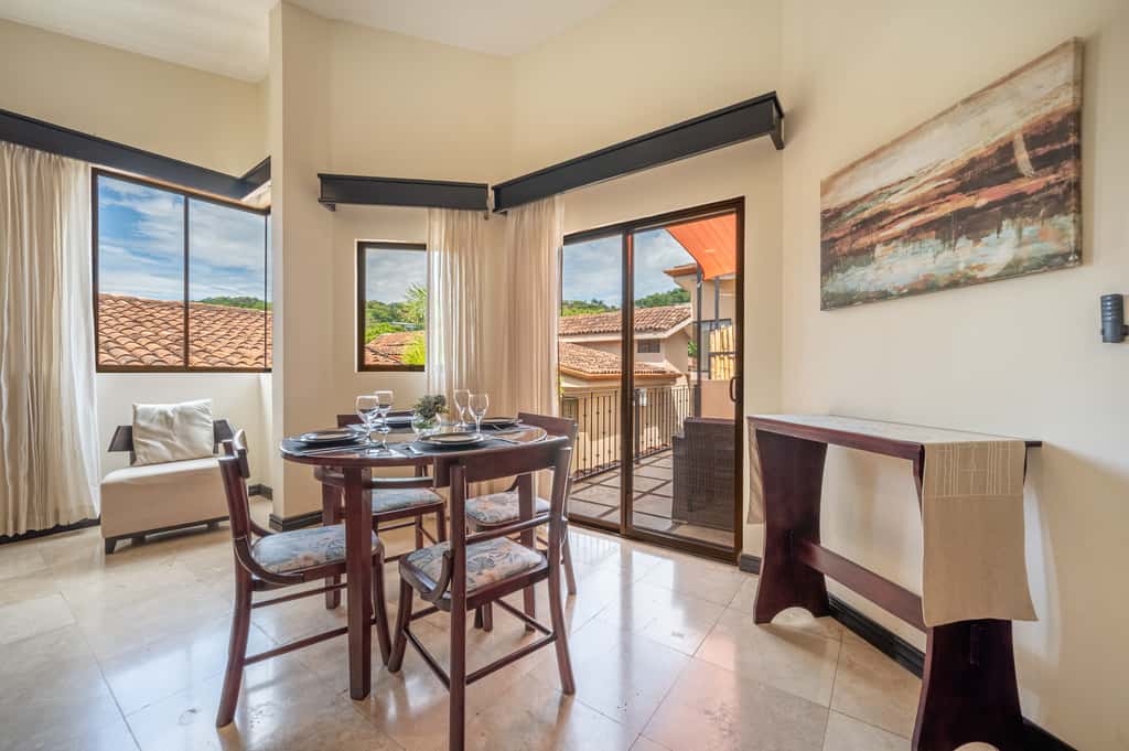Sunny 2BR: Balcony, Pool, Kitchen, Walk to Beach