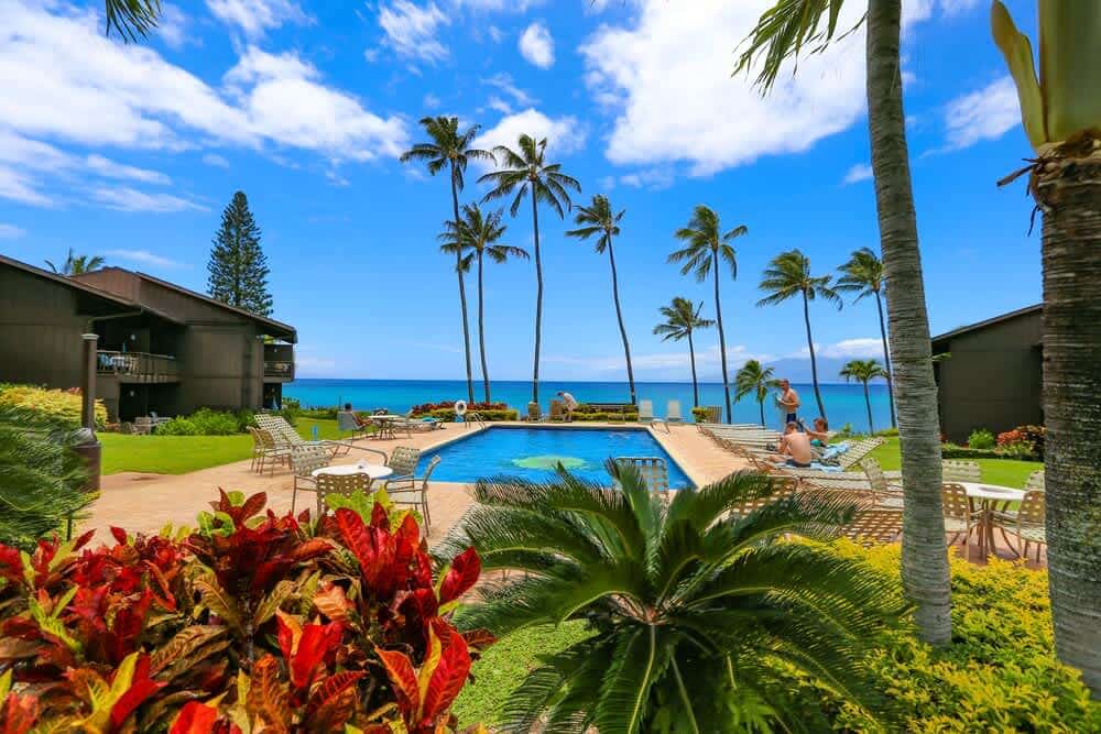 Oceanview condo with lanai, pool view, outdoor BBQ area & W/D