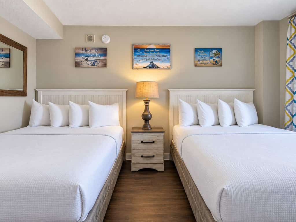 Welcome to your oceanfront getaway at the Landmark Resort in Myrtle Beach! Located on the sixth floor, this beautifully updated one-bedroom suite offers direct oceanfront views, a private balcony, and a unique open-concept layout that makes the space feel comfortable and spacious. With two queen beds in the bedroom and a full-size Murphy bed in the living area, this condo can comfortably accommodate up to six guests.