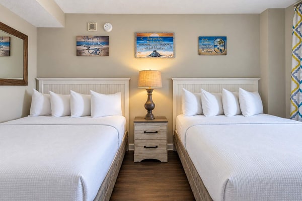 Welcome to your oceanfront getaway at the Landmark Resort in Myrtle Beach! Located on the sixth floor, this beautifully updated one-bedroom suite offers direct oceanfront views, a private balcony, and a unique open-concept layout that makes the space feel comfortable and spacious. With two queen beds in the bedroom and a full-size Murphy bed in the living area, this condo can comfortably accommodate up to six guests.
