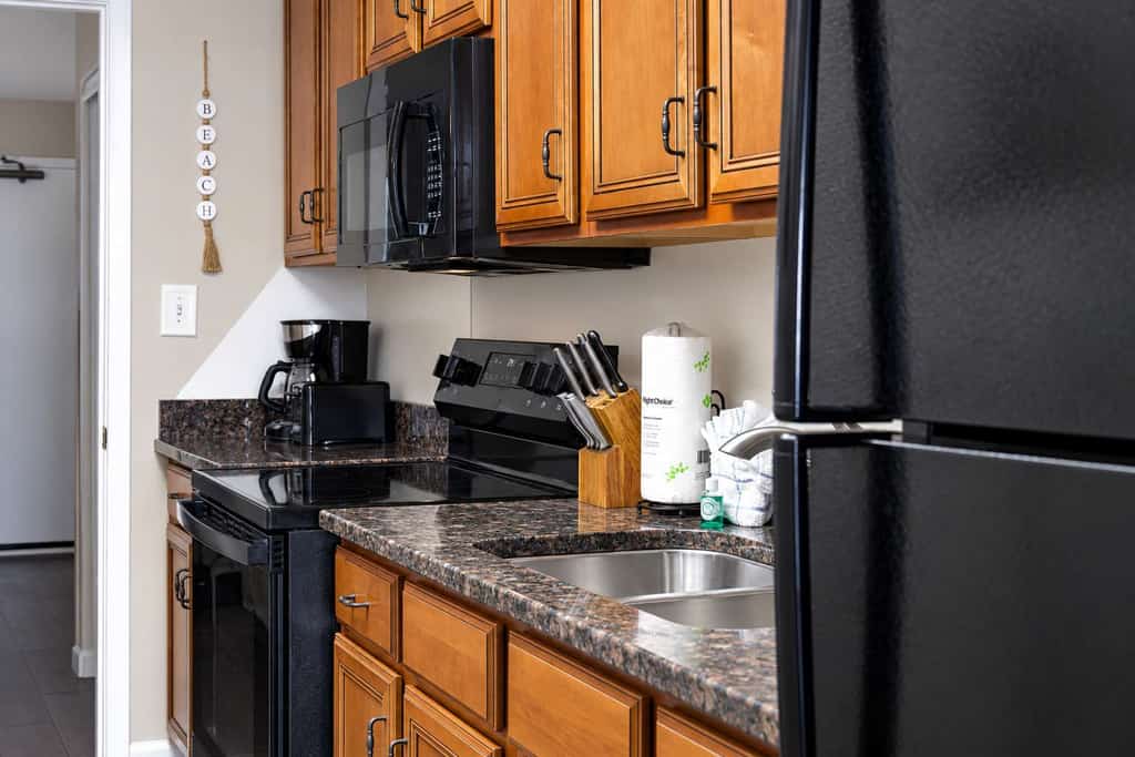 Welcome to your oceanfront getaway at the Landmark Resort in Myrtle Beach! Located on the sixth floor, this beautifully updated one-bedroom suite offers direct oceanfront views, a private balcony, and a unique open-concept layout that makes the space feel comfortable and spacious. With two queen beds in the bedroom and a full-size Murphy bed in the living area, this condo can comfortably accommodate up to six guests.