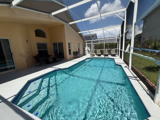 Welcome to Fun in the Sun Villa in Haines City, Florida. This spacious four bedroom house is perfect for families, offering a comfortable retreat with six beds, two bathrooms, and a fully equipped kitchen. Enjoy modern comforts like air conditioning, internet, and a television in a prime location. Our property is the ideal setting for making unforgettable family memories.