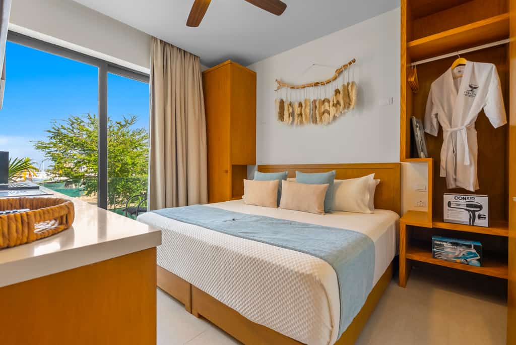 2BR condo near the ocean with pool, gym, WiFi & balcony