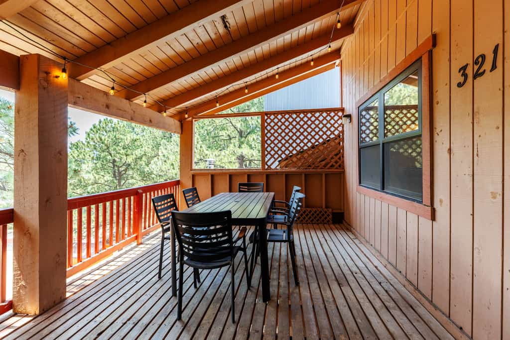Welcome to Pine Top Loft, a top-floor treetop retreat in the heart of the Angel Fire base village. Sleep six across a king bedroom, an open loft with a queen and twin, and a living room sofa bed. Wake to pine and mountain views on your covered deck, then follow the short walk to the lifts, dropping skis at your dedicated locker along the way. Winter is effortless here, and summer brings hiking, biking, and village dining just as close.