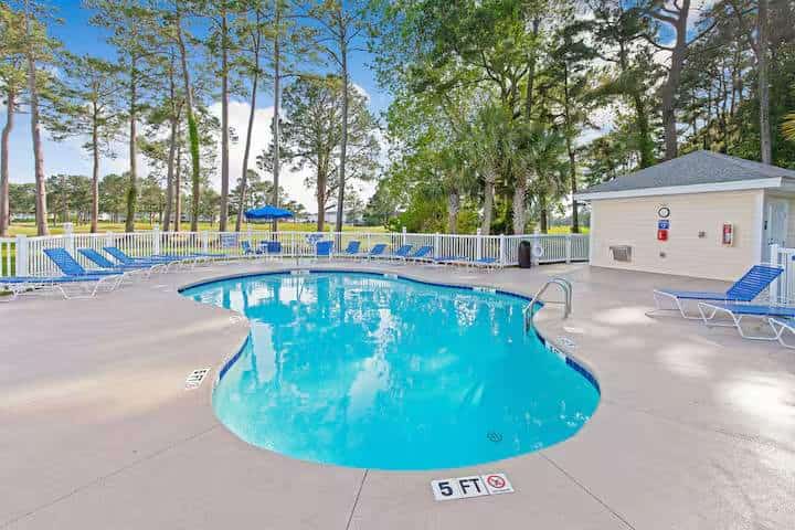 Welcome to your family-friendly getaway at Magnolia Place, a beautiful golf community conveniently located in Myrtle Beach, just one mile from the Atlantic Ocean and public beach access. This comfortable 2-bedroom, 2-bathroom condo offers the perfect combination of relaxation, recreation, and easy access to everything Myrtle Beach has to offer.
