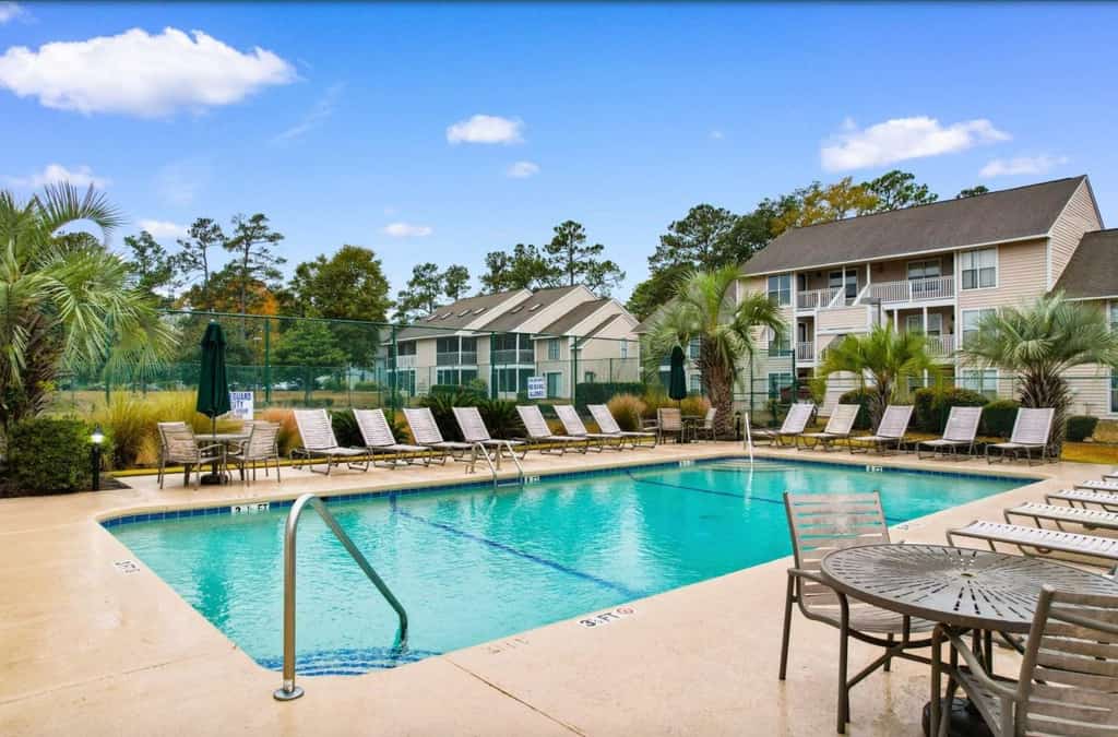 Escape to the relaxed charm of Little River Inn with this beautifully situated top-floor, end-unit condo, offering extra privacy, comfortable living spaces, and peaceful views. Whether you're planning a family vacation, golf getaway, or relaxing Grand Strand escape, this inviting home provides the perfect place to unwind, and is only 7 minutes away from Cherry Grove Beach!